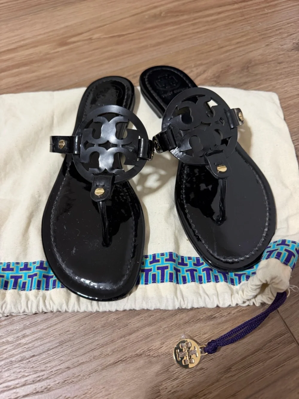 Tory Burch Black Patent Miller Thong Sandals with Gold Accents